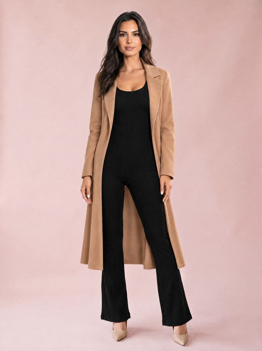 Comfy Club Bodysuit with Flare Pants in Black, layered under a long camel duster coat.